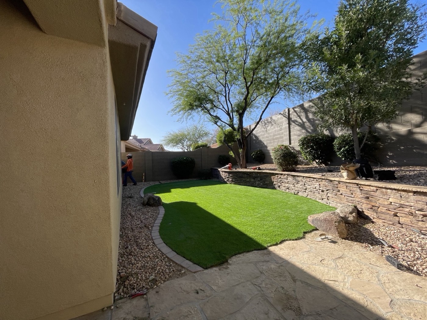 Designed Scottsdale backyard with turf and stonework